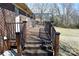 Spacious wooden deck with dark railings provides a perfect spot for outdoor entertaining at 4866 E Nc Hwy 150 Hwy, Lincolnton, NC 28092