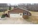 Spacious detached garage featuring a large door and a convenient side entrance at 4866 E Nc Hwy 150 Hwy, Lincolnton, NC 28092
