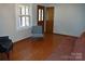 Spacious living room featuring hardwood floors and a large window for natural light at 4866 E Nc Hwy 150 Hwy, Lincolnton, NC 28092