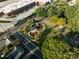 Aerial view of park and buildings with mature trees and winding roads at 604 Smith St # A, Mooresville, NC 28115