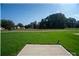 Spacious backyard featuring a lush green lawn and mature trees at 616 Smith St # A, Mooresville, NC 28115