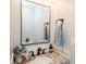 Bathroom featuring granite countertops, black faucet, and white subway tile backsplash at 6322 Old Pineville Rd # E, Charlotte, NC 28217