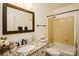 Bathroom featuring granite countertops and a bathtub-shower combo at 6322 Old Pineville Rd # E, Charlotte, NC 28217