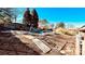 Backyard featuring an in-ground pool, a weathered deck, and a partially fenced yard at 742 Aquadale Rd, Albemarle, NC 28001
