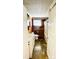 Bathroom featuring a tiled floor, wood paneled walls, and a single vanity sink at 742 Aquadale Rd, Albemarle, NC 28001