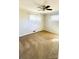 Carpeted bedroom features ample natural light and a ceiling fan for added comfort and air circulation at 742 Aquadale Rd, Albemarle, NC 28001