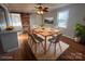 Dining room with modern table, rug and sliding barn door at 742 Aquadale Rd, Albemarle, NC 28001