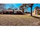 Brick home with a chimney and nice tree in front at 742 Aquadale Rd, Albemarle, NC 28001