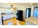 Updated kitchen with white cabinets and an eat in bar area at 742 Aquadale Rd, Albemarle, NC 28001