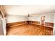 Spacious living room with hardwood floors, a decorative ceiling fan, and ample natural light at 742 Aquadale Rd, Albemarle, NC 28001