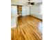 Open-concept living room with hardwood floors and natural lighting at 742 Aquadale Rd, Albemarle, NC 28001