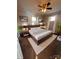 Staged main bedroom featuring modern furniture, neutral walls and natural light at 742 Aquadale Rd, Albemarle, NC 28001