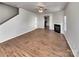 Open living room with wood floors, fireplace, and ample natural light at 8353 Ainsworth St, Charlotte, NC 28216
