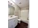 Clean bathroom featuring a vanity, toilet, and tub, creating a comfortable and functional space at 10550 Worsley Ln, Charlotte, NC 28269