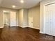A bedroom area is well lit with multiple storage closets at 10550 Worsley Ln, Charlotte, NC 28269