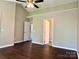 Well lit hallway shows access to other rooms at 10550 Worsley Ln, Charlotte, NC 28269