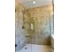 Updated shower with tiled walls and frameless glass doors at 10550 Worsley Ln, Charlotte, NC 28269