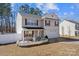 Charming home with manicured landscaping, white picket fencing, and a two-car garage at 10816 Pointer Ridge Dr, Charlotte, NC 28214