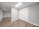 Finished basement featuring wood-look floors, neutral walls and storage at 115 Scotch Irish Ln, Troutman, NC 28166