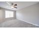 Bedroom with neutral walls, carpet floors, a ceiling fan and a large, bright window at 115 Scotch Irish Ln, Troutman, NC 28166