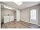 Spacious laundry area featuring modern appliances and a convenient walk-out door at 115 Scotch Irish Ln, Troutman, NC 28166