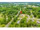 Beautiful aerial view of a tree-lined street and lush landscaping in a neighborhood near Downtown Troutman, North Carolina at 119 Era St, Troutman, NC 28166