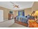 Comfortable bedroom featuring a large bed, side tables, and a bright window with curtains at 119 Era St, Troutman, NC 28166