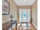 Elegant foyer with hardwood floors, decorative rug, and a stylish lamp at 119 Era St, Troutman, NC 28166