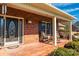 Charming front porch with rocking chairs and brick detail, creating a welcoming outdoor space at 119 Era St, Troutman, NC 28166