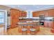 Spacious kitchen featuring custom wood cabinetry, granite countertops, and stainless steel appliances at 119 Era St, Troutman, NC 28166
