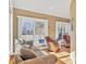 Comfortable living room with large windows, hardwood floors, and relaxed seating at 119 Era St, Troutman, NC 28166