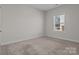 Bedroom featuring neutral carpet and natural light at 127 Tradesmen Trl, Troutman, NC 28166