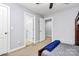 Bedroom with neutral-toned walls and carpet and views into the closet at 14125 Derby Farm Ln, Charlotte, NC 28278
