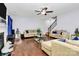 Spacious living room featuring hardwood floors, stylish decor, and an open layout at 14125 Derby Farm Ln, Charlotte, NC 28278