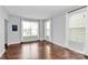 Bright living room featuring lots of natural light and hardwood floors at 14125 Derby Farm Ln, Charlotte, NC 28278