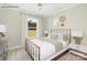 Cozy bedroom with a window overlooking a scenic view, and neutral tones throughout at 1614 Shoals Ave # 151, Belmont, NC 28012