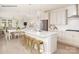 Bright, modern kitchen with white cabinets, stainless appliances, and a large island with bar seating at 1614 Shoals Ave # 151, Belmont, NC 28012