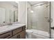 Bathroom featuring granite vanity, toilet, and glass shower, designed with modern fixtures and neutral colors at 1615 Shoals Ave # 158, Belmont, NC 28012