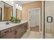 Elegant bathroom featuring a double vanity, modern fixtures, and a walk-in closet at 1615 Shoals Ave # 158, Belmont, NC 28012
