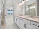 Bathroom featuring double sink vanity with granite counters, tile flooring, and a glass-enclosed shower at 1615 Shoals Ave # 158, Belmont, NC 28012