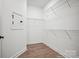 Spacious walk-in closet with ample shelving for optimal organization and storage at 1615 Shoals Ave # 158, Belmont, NC 28012