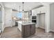 Modern kitchen with granite countertops, stainless appliances, and a center island at 1615 Shoals Ave # 158, Belmont, NC 28012