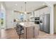 Spacious kitchen with stainless steel appliances, a kitchen island, and modern white cabinetry at 1615 Shoals Ave # 158, Belmont, NC 28012