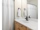 Well-lit bathroom with a spacious sink, neutral colors, and fresh white towels at 1742 Verdict Ridge Dr, Denver, NC 28037