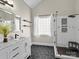 Stylishly renovated bathroom featuring a glass enclosed shower and marble vanity at 1742 Verdict Ridge Dr, Denver, NC 28037