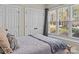 Comfortable bedroom with bright window views and ample closet space at 1742 Verdict Ridge Dr, Denver, NC 28037