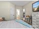 Inviting bedroom with a view into the bathroom and ample storage at 1742 Verdict Ridge Dr, Denver, NC 28037