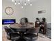Cozy dining area featuring a round table, modern lighting, and a coffee bar at 1742 Verdict Ridge Dr, Denver, NC 28037
