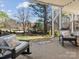 Relaxing outdoor patio with comfortable seating and a serene view of the landscaped yard at 1742 Verdict Ridge Dr, Denver, NC 28037