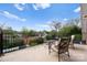 Charming balcony featuring comfortable seating and offering a picturesque neighborhood view at 1754 Sterling Rd, Charlotte, NC 28209